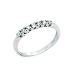 Λευκόχρυσο σειρέ δαχτυλίδι Κ14 με επτά ζιργκόν πέτρες